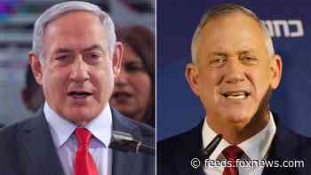 Israeli election exit polls put Netanyahu, allies just short of majority