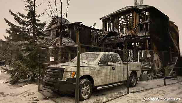 Fire destroys two Riverbend homes