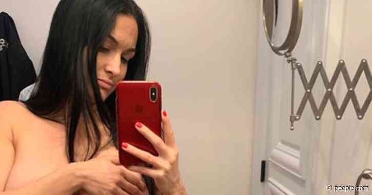 Pregnant Nikki Bella Shows Off Baby Bump Topless at 18 Weeks While Discussing Gray Hair and Skin Changes
