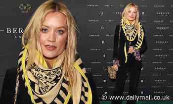 Love Island host Laura Whitmore stuns in a velvet black suit at concierge service launch