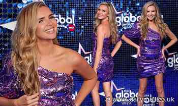 Nadine Coyle wears a purple sequinned mini dress at the 2020 Global Awards