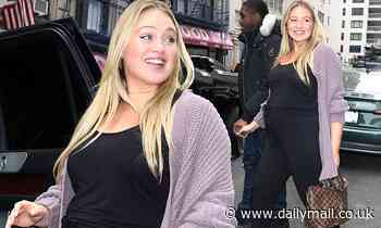 Heavily pregnant Iskra Lawrence shows off her baby bump in black vest top in NYC