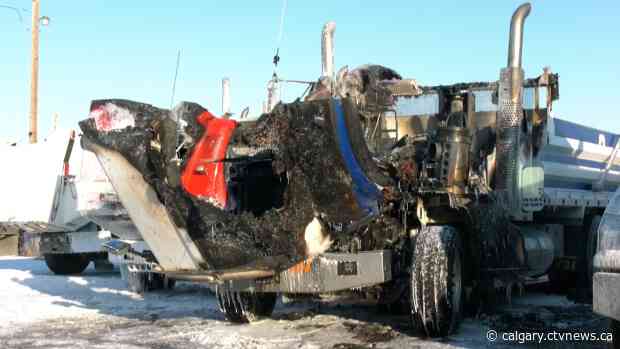 Police seek arsonist in northeast Calgary dump truck fires