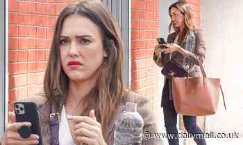 Jessica Alba cuts a chic figure in a fitted brown blazer as she arrives to Baby2Baby headquarters