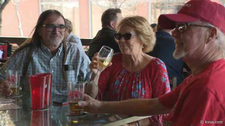 Fan cheer on UArizona women’s basketball team from campus