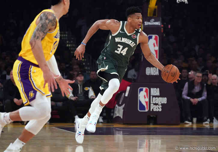 Bucks’ Giannis Antetokounmpo applauds LeBron James’ performance