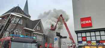 Veel rook bij uitslaande brand in winkelstraat Winterswijk