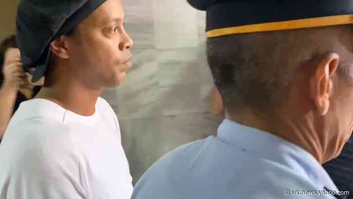 Former Barcelona forward Ronaldinho heads to court in Paraguay
