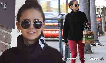 Nina Dobrev suits up in hot pink leggings and a DKNY zip-up for a morning workout and juice run