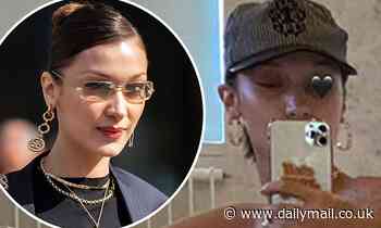 Bella Hadid poses topless while lounging with strategically placed Mexican food on Instagram