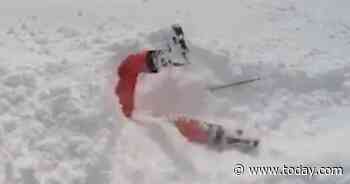 Stunning video shows rescue of skier trapped headfirst in the snow
