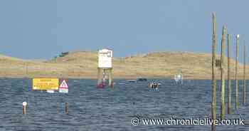 Child, 3, and parents rescued after two cars submerged by tide on Holy Island causeway