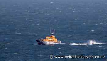 Five rescued after cars trapped by tide on causeway