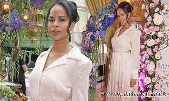 Idris Elba's wife Sabrina looks radiant in a rose pink shirt dress at glittering fundraiser