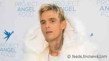 Aaron Carter reveals face tattoo with girlfriend's name