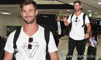 Hollywood star Chris Hemsworth looks hunky as he throws up the peace sign in Tokyo - Daily Mail