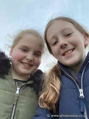 Schoolgirls helping community by collecting bags of rubbish - St Helens Star