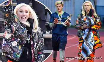 Gwen Stefani sports orange pants while cheering on her son Kingston as he wins a soccer trophy