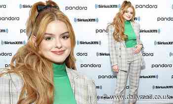 Ariel Winter adds a pop of neon green under her chic plaid suit for her visit to SiriusXM studios