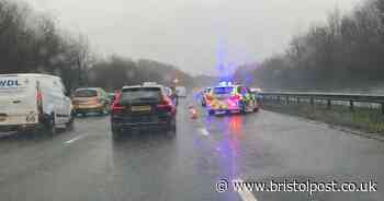 Crash on M4 causes six miles of traffic as heavy rain affects the area