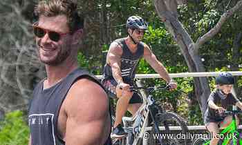Chris Hemsworth takes his kids for a bike ride near his home in Byron Bay - Daily Mail
