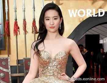 Mulan Star Yifei Liu Embodies a Real-Life Disney Princess at Red Carpet Premiere