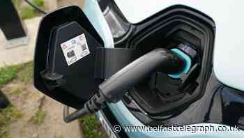 Grants for new electric cars reduced by £500