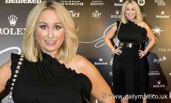 Jane Bunn stuns in a one-shoulder cocktail dress at Glamour on the Grid