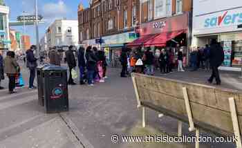 Huge line of people seen queuing up outside Sutton store amid coronavirus concerns