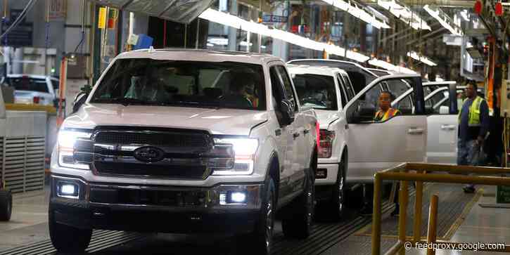 Coronavirus fears are hammering automaker stocks, but the assembly lines are still running (GM, F, FCAU, TSLA, RACE)