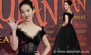 Liu Yifei exudes glamour in black floral printed dress as she walks the red carpet at Mulan premiere