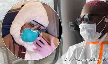 Tinie Tempah takes inspiration from Naomi Campbell as he wears a hazmat suit, gloves and a mask