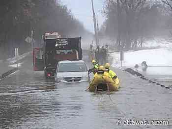 RESCUED: Firefighters save stranded school van driver from water pool in rural Ottawa - Ottawa Sun