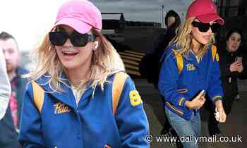 Rita Ora keeps it casual in jeans and a baseball cap as she arrives for Sports Relief