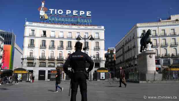 Spain locks down as coronavirus infections spike