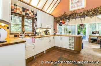 Three-bed barn conversion with garden room and stream is up for sale