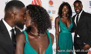 Love Island's Priscilla Anyabu kisses Mike Boateng at the British Ethnic Diversity Sports Awards