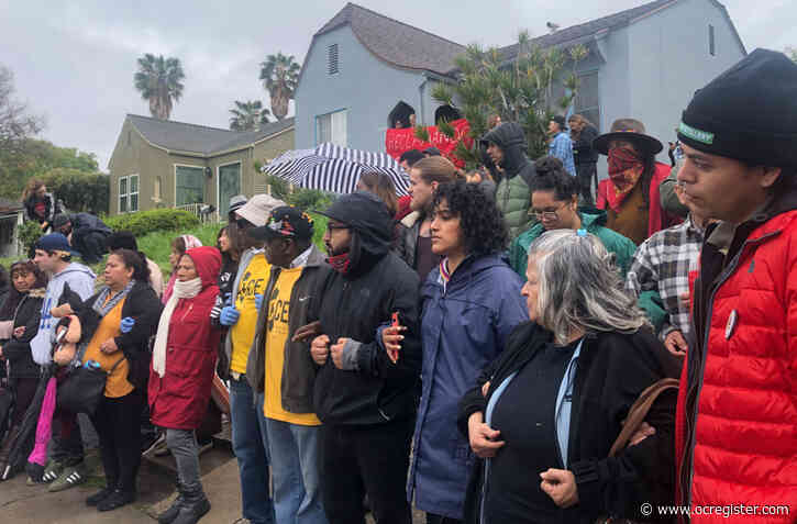 Amid converging crises, protesters in L.A. aim to ‘reclaim’ vacant Caltrans homes