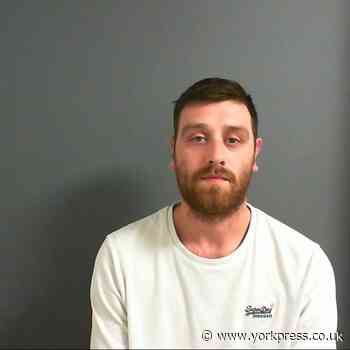 Man who threatened to behead bailiff with meat cleaver jailed