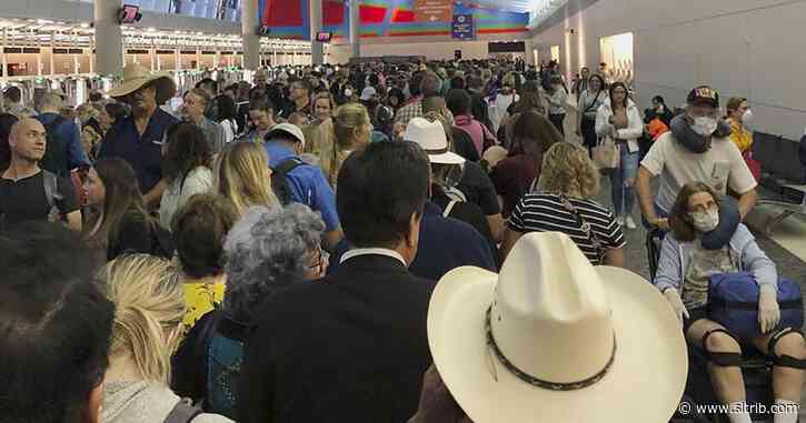 Coronavirus screenings: Travelers forced to wait several hours in densely crowded U.S. airports