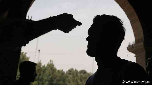 Virus restrictions tighten, disrupting daily life, worship