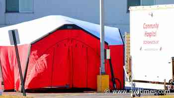 Medical tent outside Munster hospital being prepped for possible coronavirus response - nwitimes.com