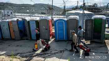 Child dies in fire in Greek migrant camp
