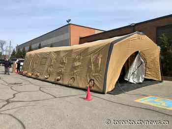 'This is an absolutely critical time': Food bank puts up tent to ensure food donations amid COVID-19
