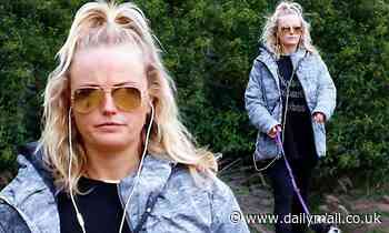 Malin Akerman enjoys some fresh air with her pooch