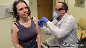 COVID-19 vaccine test begins as volunteer patient administered 1st shot