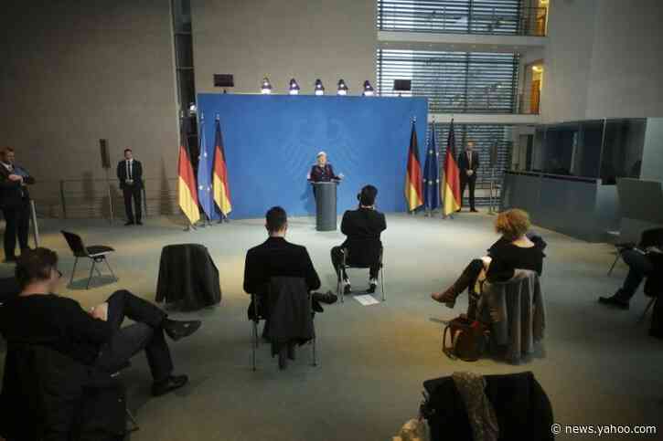 Merkel announces sweeping curbs to keep Germans home in virus fight