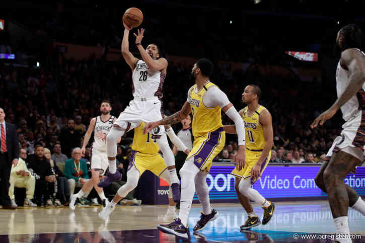 Four players from the Nets, the Lakers’ last opponent, test positive for coronavirus