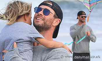 Chris Hemsworth heads to an isolated beach near his Byron Bay home to fly a kite - Daily Mail