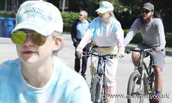 Kate Hudson keeps spirits up in festive tie-dye sweats while biking with Danny Fujikawa